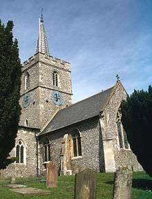 stone church with a slim metal spire