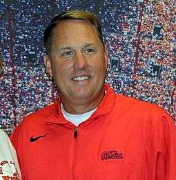 Head shot of coach Freeze in a red shirt.