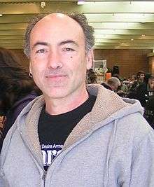 A man in grey sweatshirt