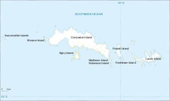  Outline map of a group of irregular-shaped islands the largest of which is labelled "Coronation Island". Laurie Island is shown at the eastern (right) end of the group.